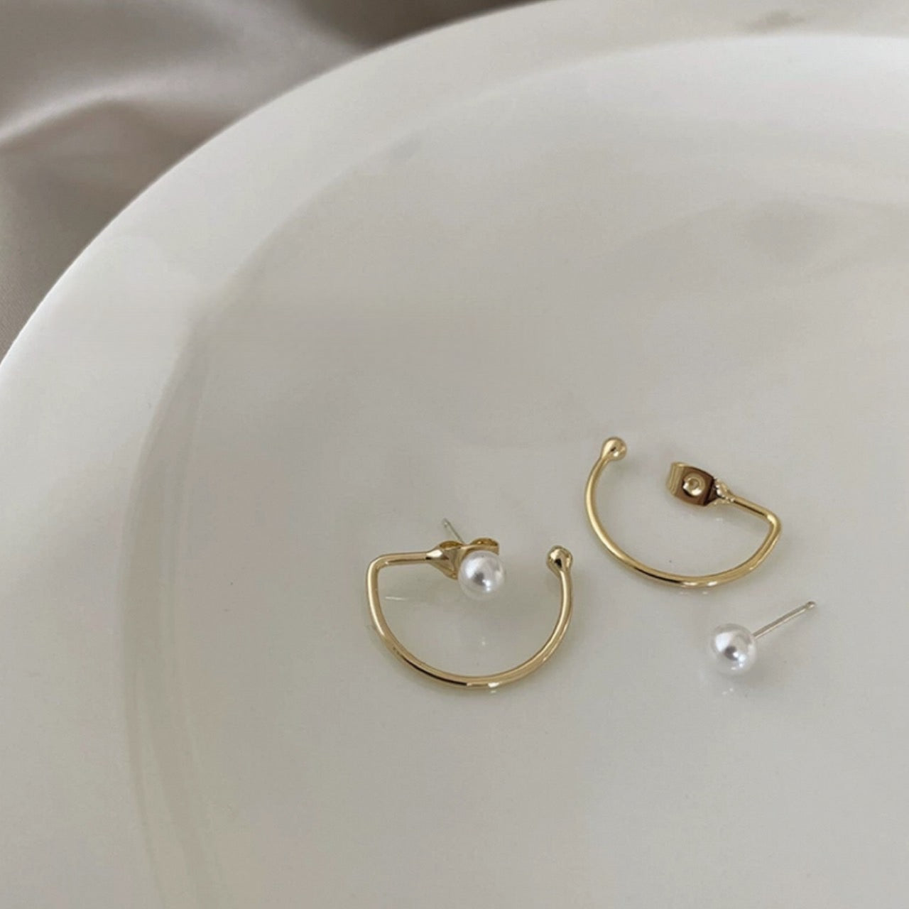 half hook pearl pierce