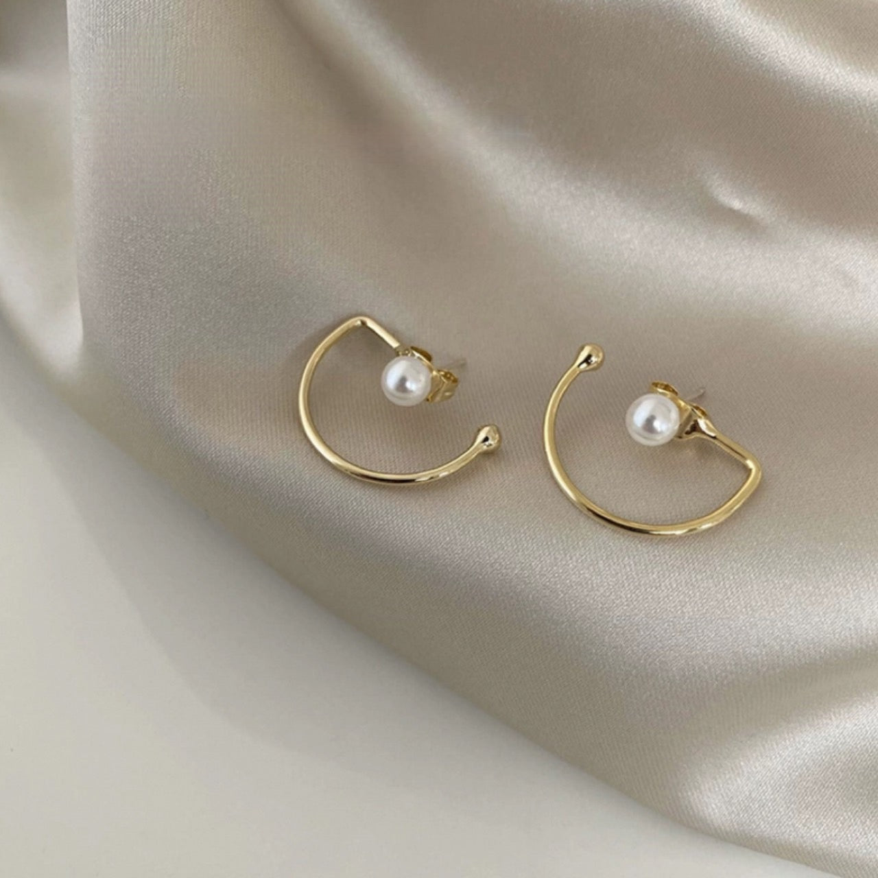 half hook pearl pierce