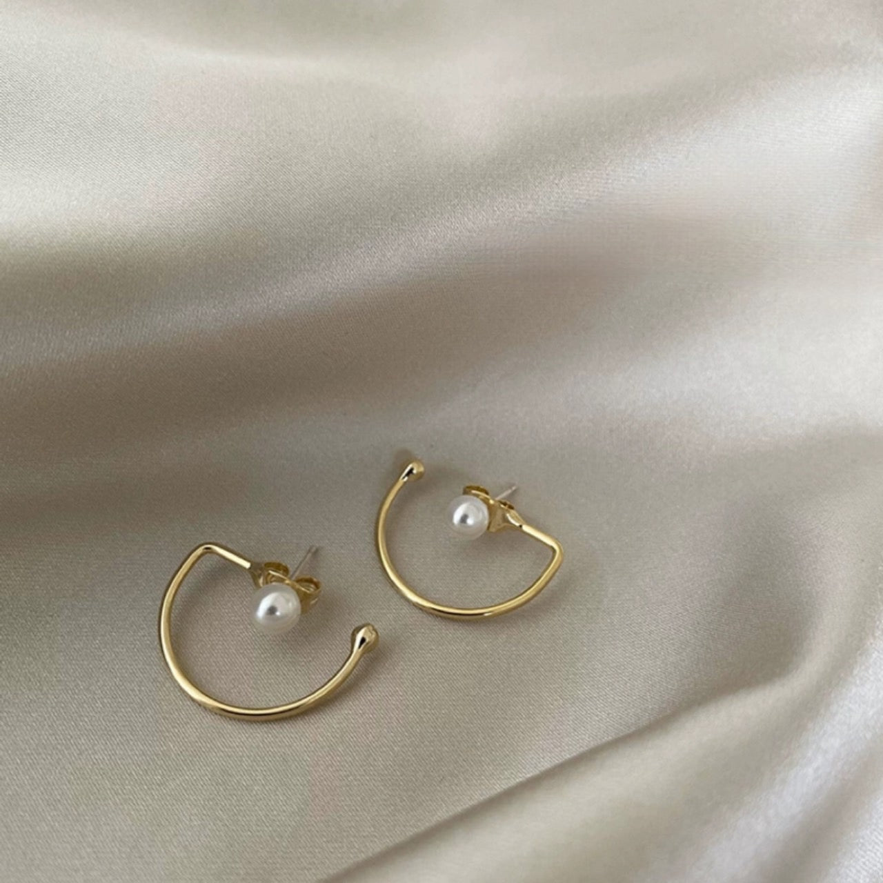 half hook pearl pierce