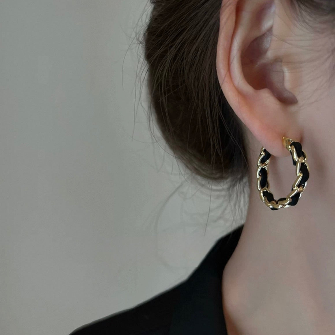 elegant black twist pierce