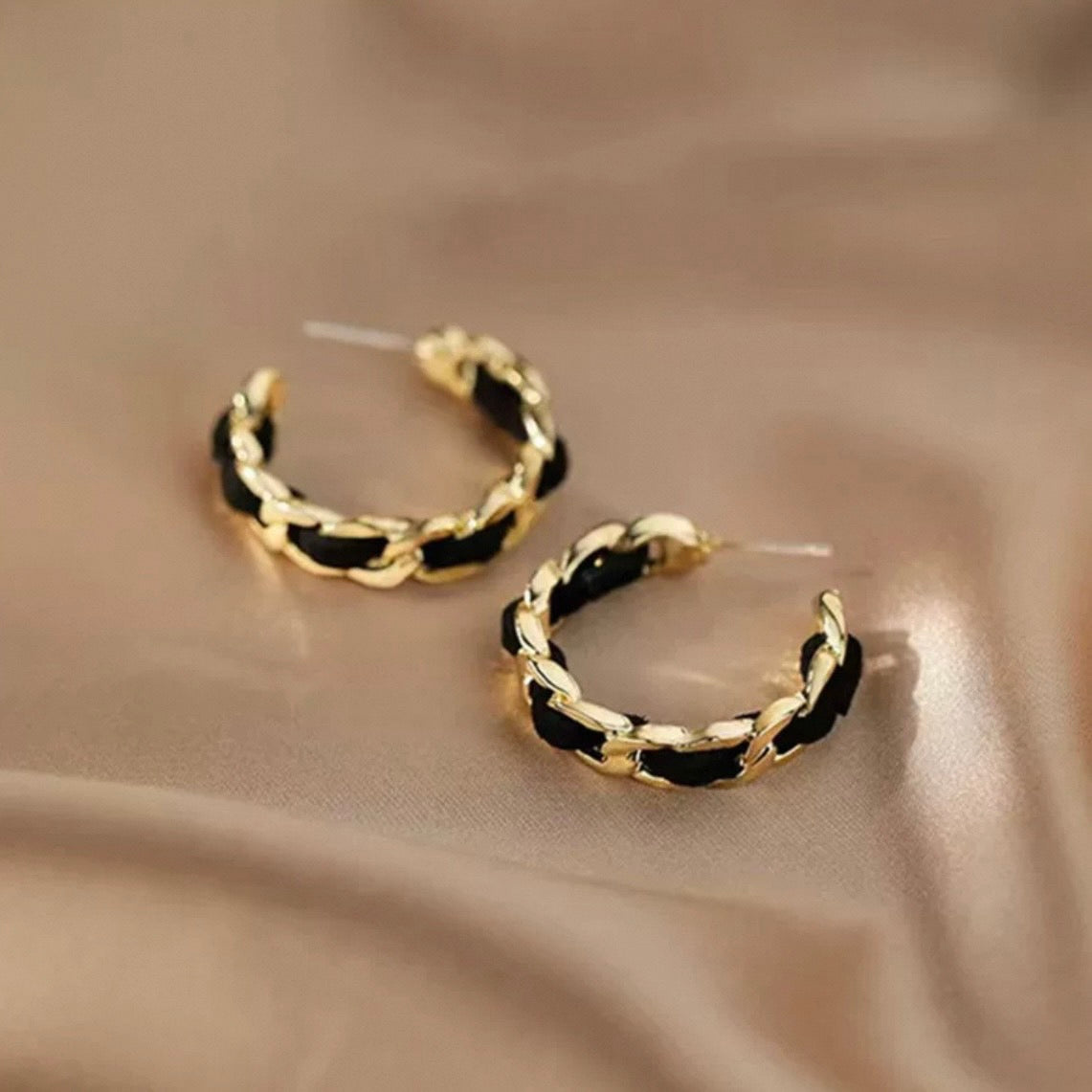 elegant black twist pierce