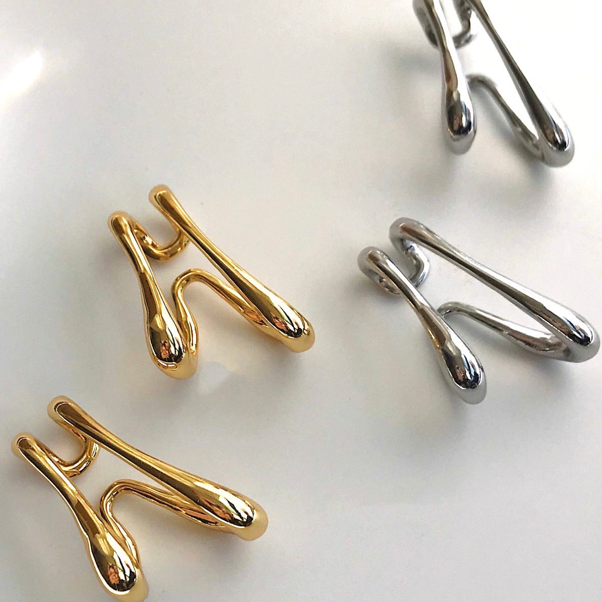 melty curve earcuff