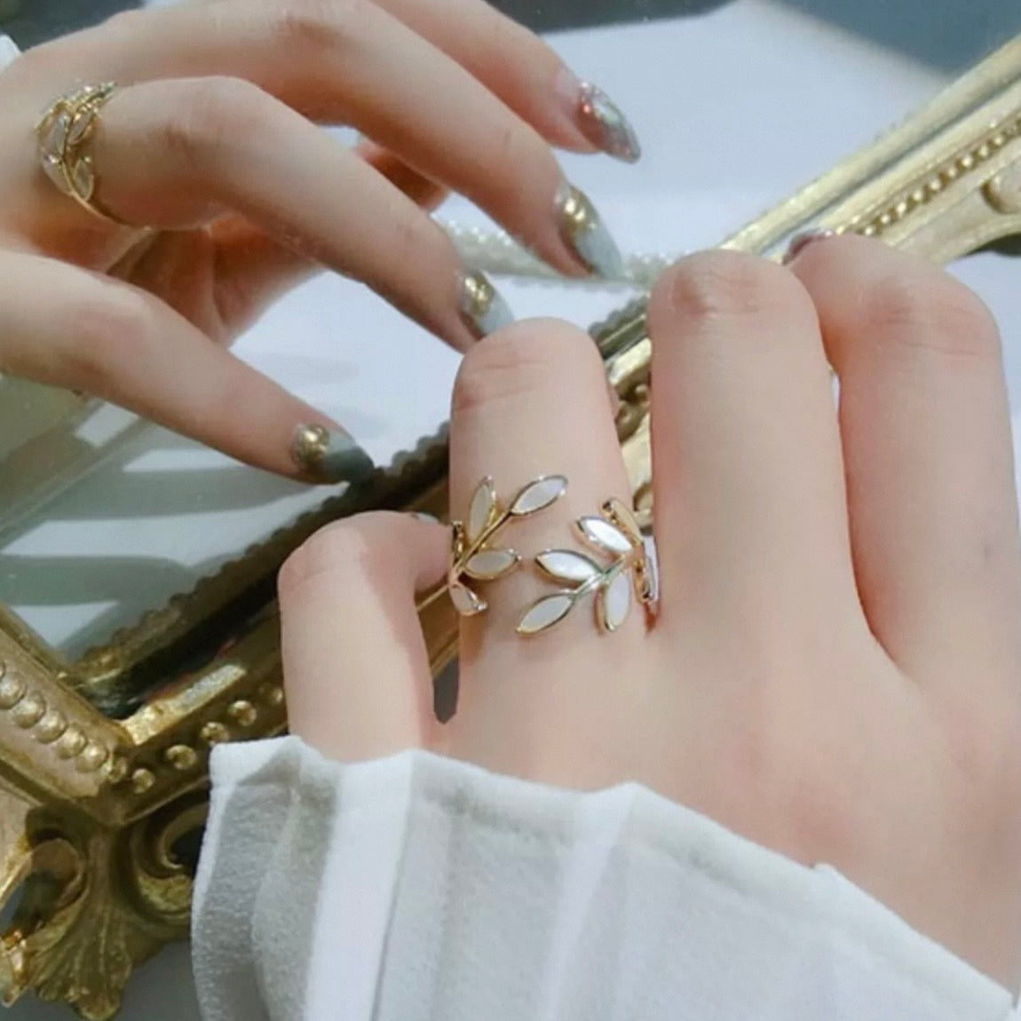 white leaf open ring