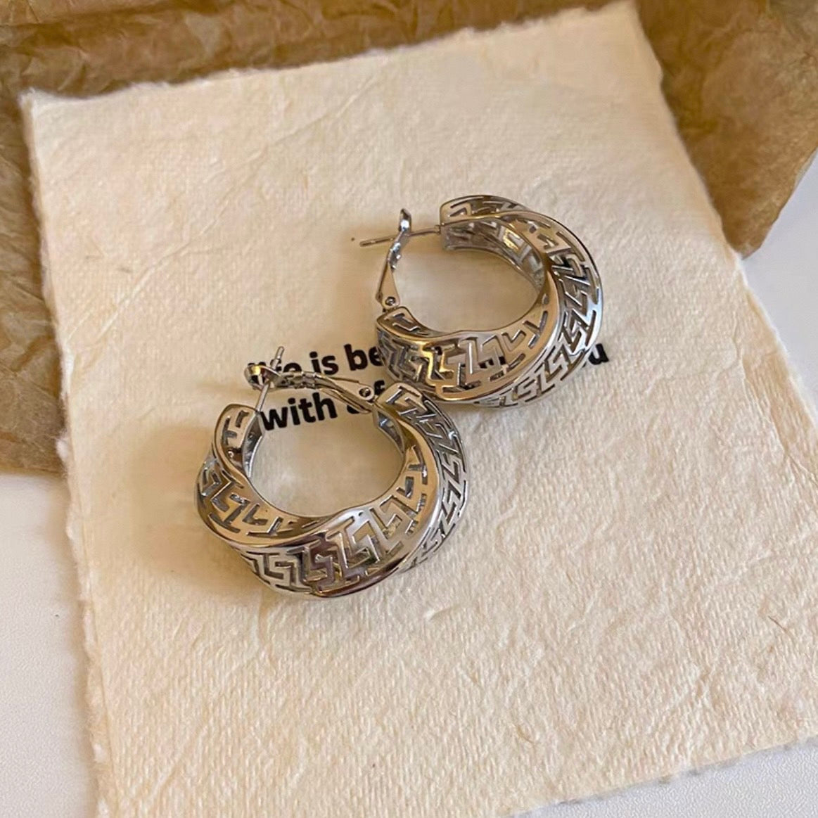 mosaic hoop pierce