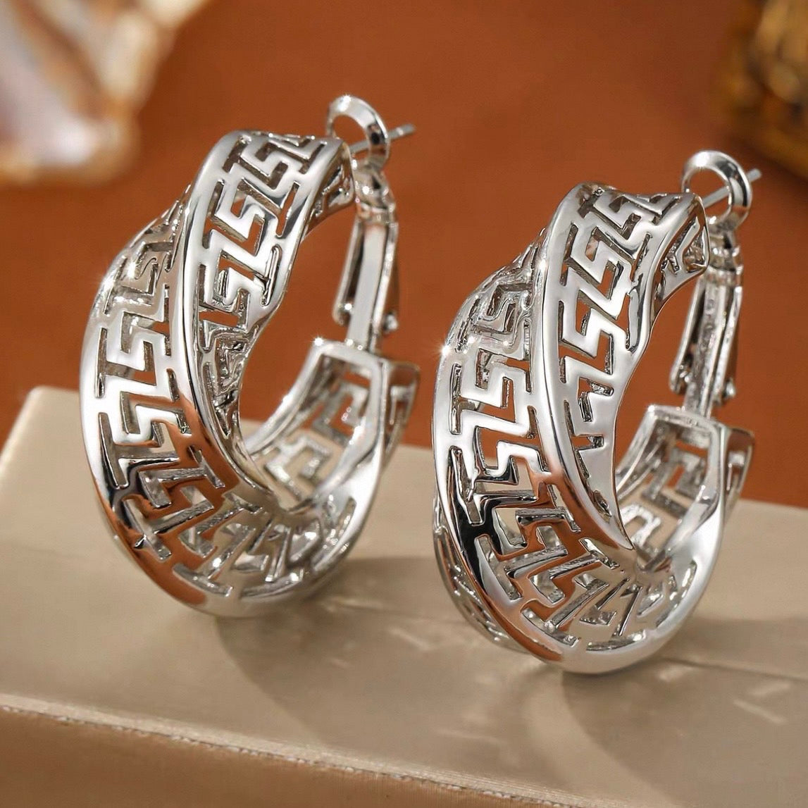 mosaic hoop pierce