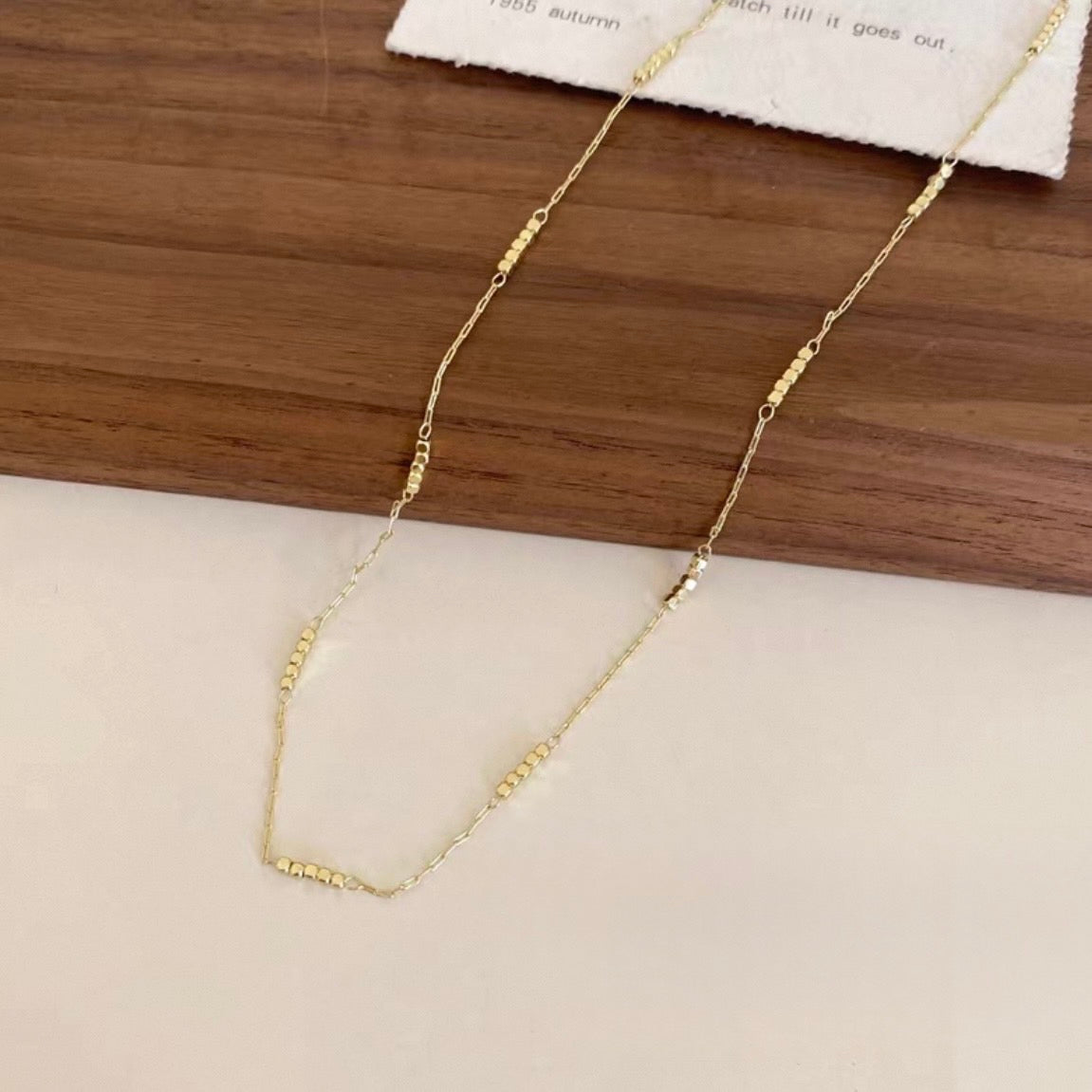 tiny dot gold necklace