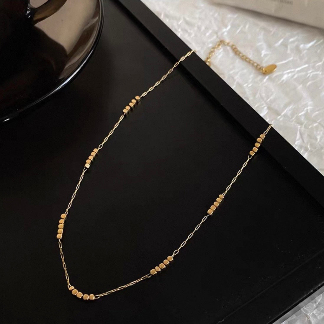 tiny dot gold necklace