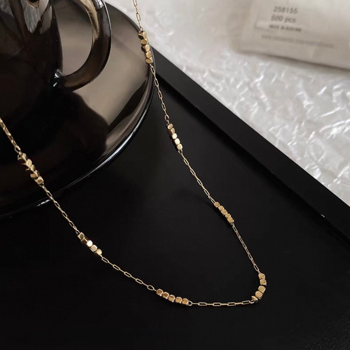 tiny dot gold necklace