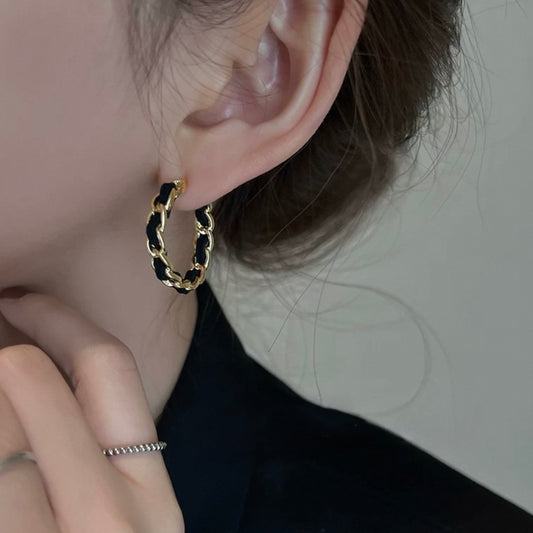 elegant black twist pierce