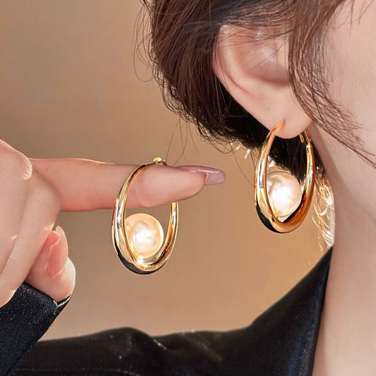 gold orb pearl pierce