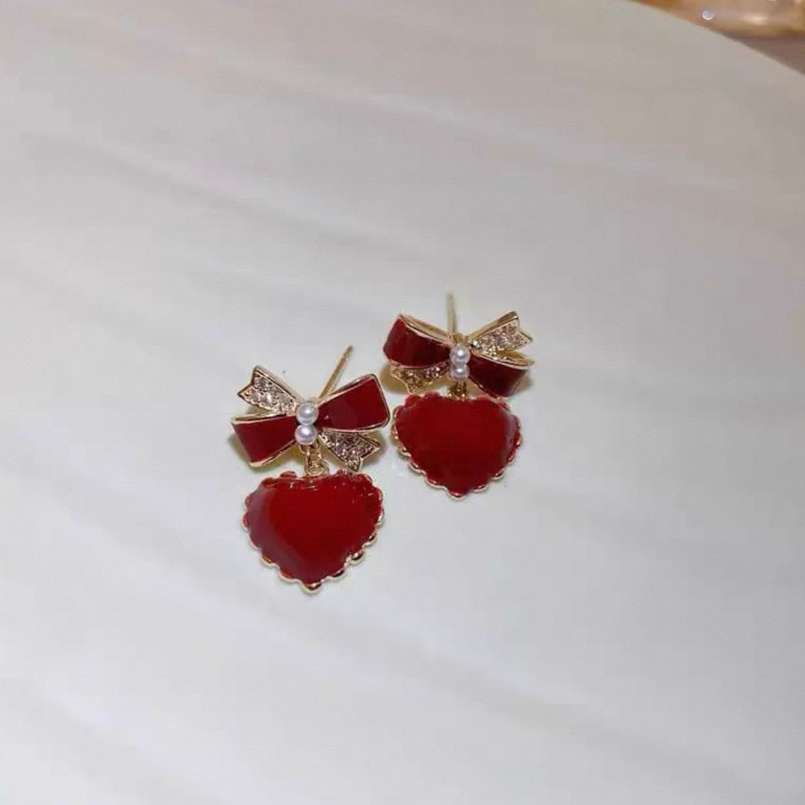 rouge ribbon heart pierce