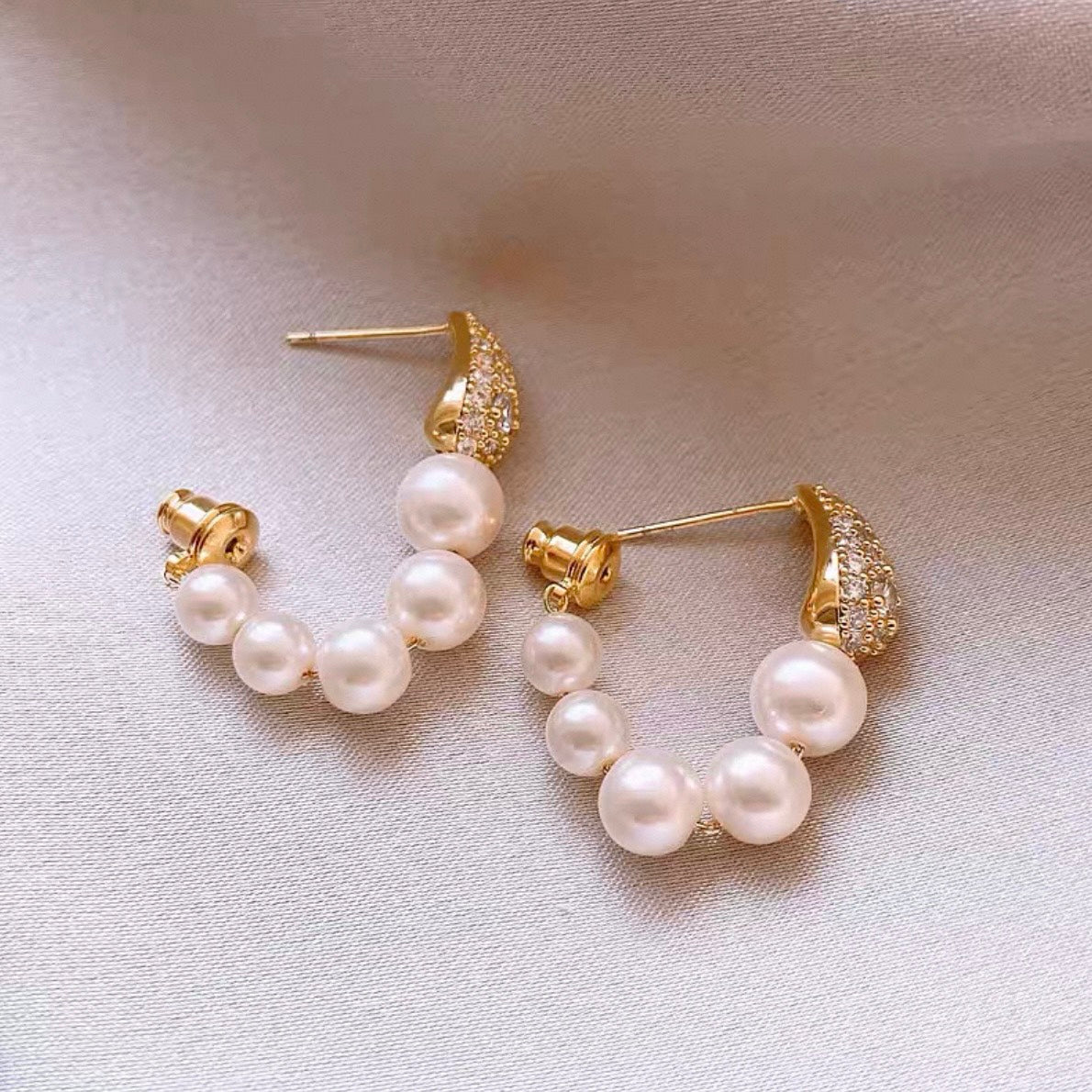 pearl crescent glow pierce