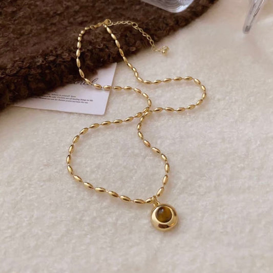 tiger eye orbit necklace